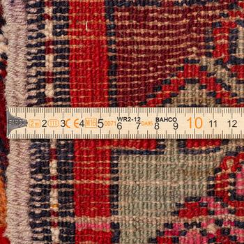 A semi-antique Anatolian runner, c. 409 x 159 cm.