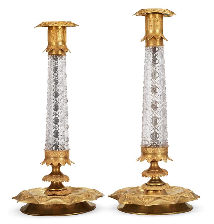 Two similar Russian 1830's gilt brass and glass candlesticks.