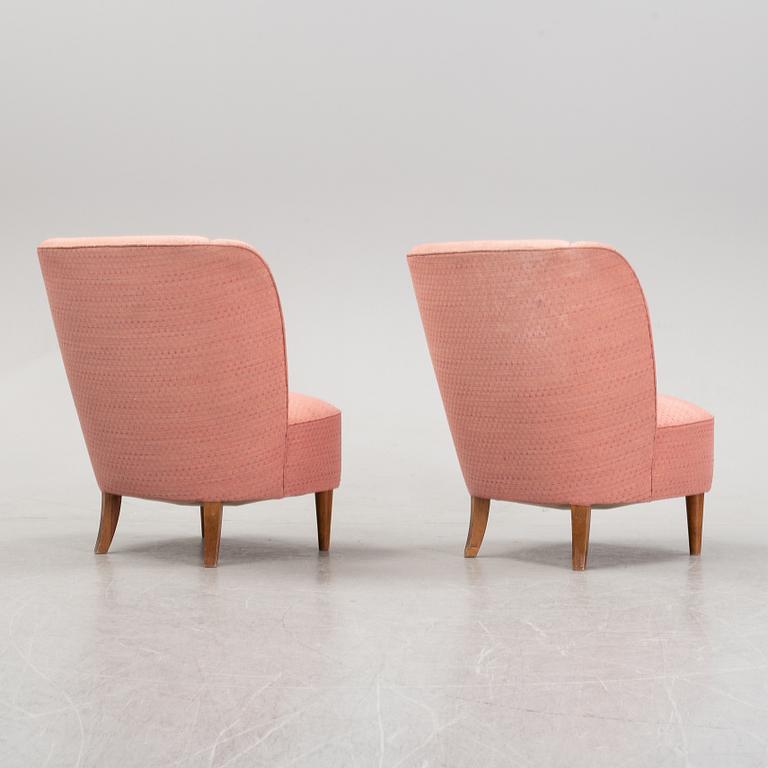 A pair of 1940's easy chairs.