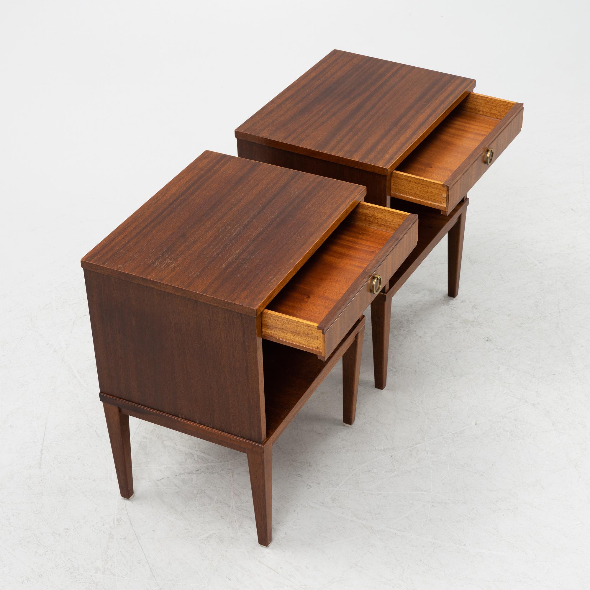 Nordiska Kompaniet, a pair of mahogany veneer bedside tables, 'Markus', the model designed in 1943.