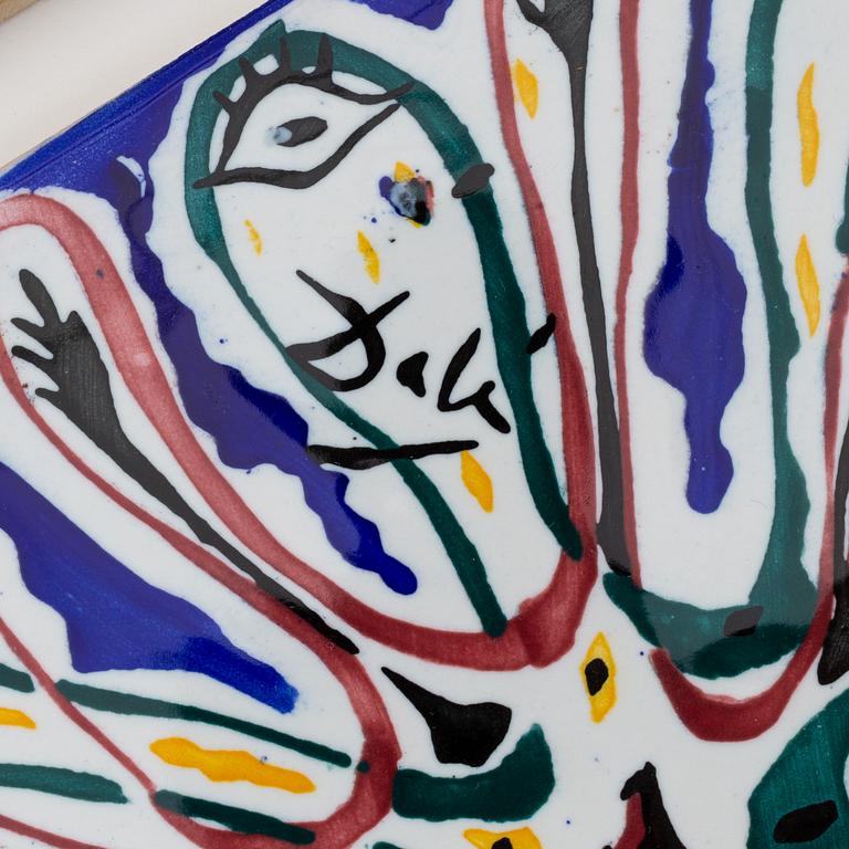 A set of six earthenware tile plates, after Salvador Dalí, late 20th century.