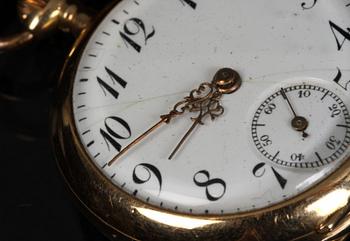 KLOCKA samt KLOCKKEDJA, guld, 14 k samt 18 k.