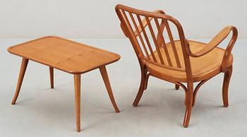 A birch bentwood armchair and table, by Thonet, 1930's.