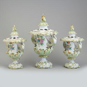 Three mid 20th century porcelain urns by Herend, Hungary.