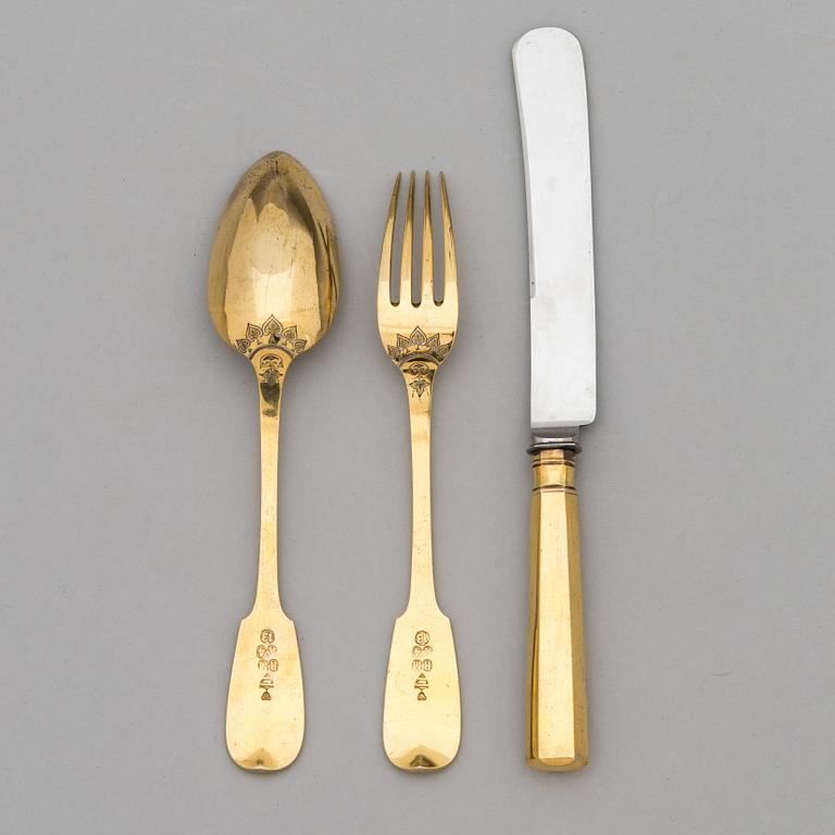 A 3-piece gilt silver cutlery set, maker's mark of Otto Roland Mellin, Helsinki 1882.