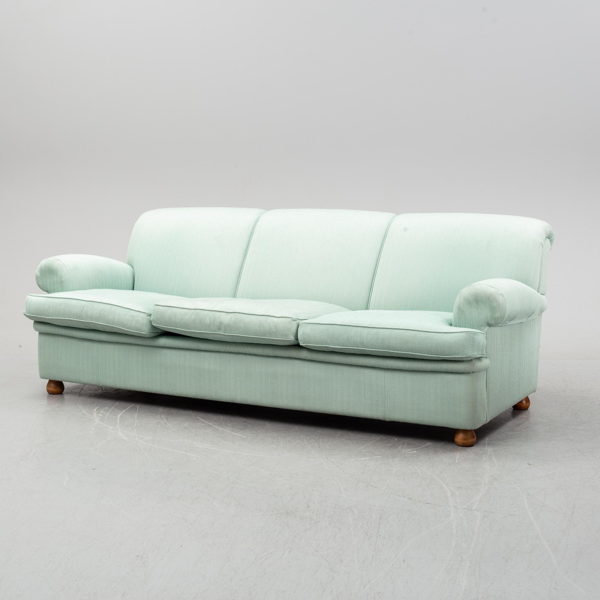 A model 703 sofa by Josef Frank for Firma Svenskt Tenn.