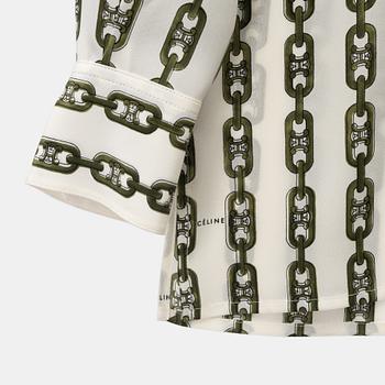 Céline, a silk blouse, size 34.