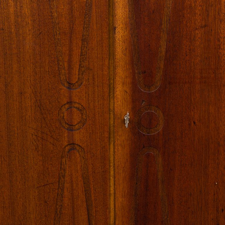 A cabinet veneered with teak designed by Kirke Nielsen for Abrahamssons Möbelfabrik in Smålands Taberg, 1950´s.