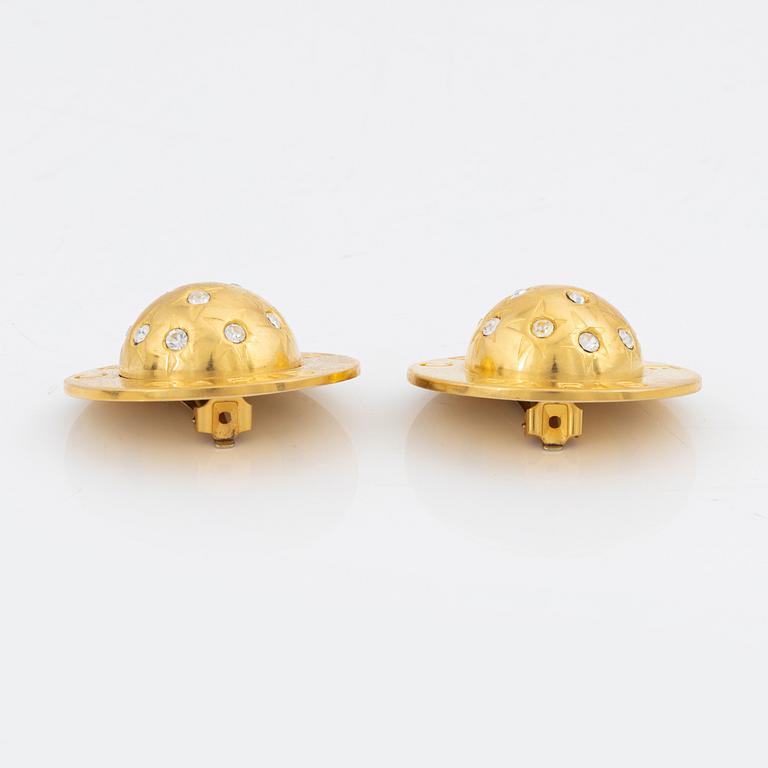 Céline, a pair of gold tone and rhinestone clip-on earrings.