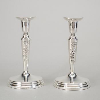 A pair of silver candlesticks by Meya Lerible for Mema, Linköping 1994.