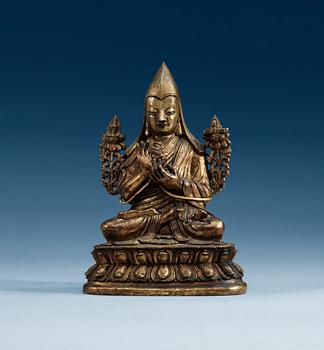 1434. A gilt bronze figure of a Lama, Qing dynasty, 18th Century.