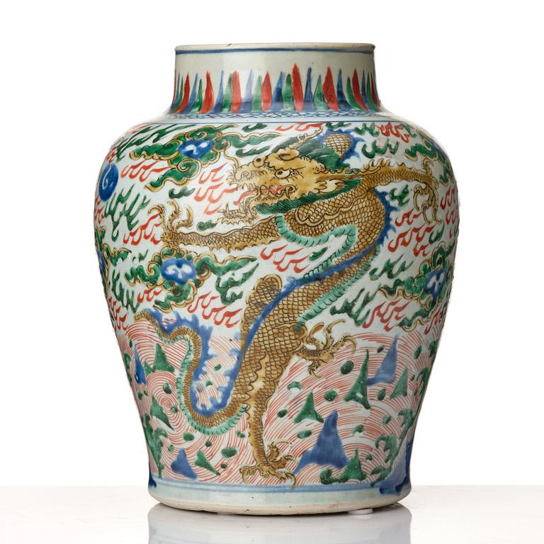 A matched pair of Transitional Wucai jars, 17th Century.