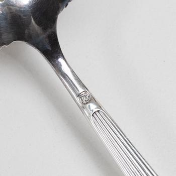 C.G. Hallberg, A Swedish silver sugar bowl with glass insert, mark of CG Hallberg, Stockholm 1896.