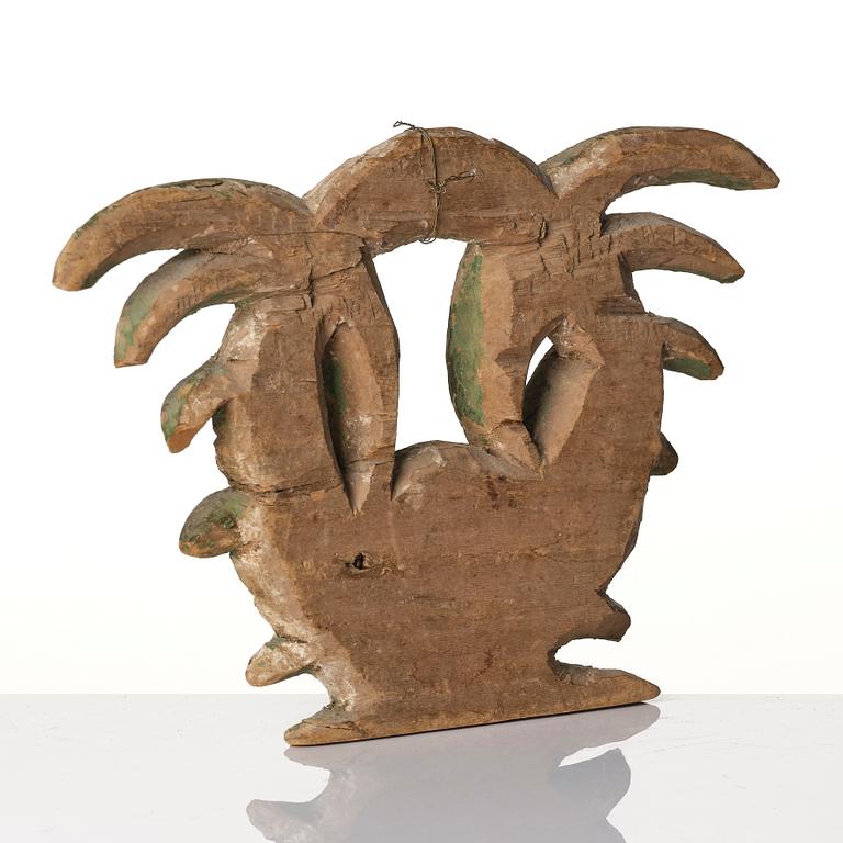 A Swedish baroque carved and painted wreath, later part 17th century.