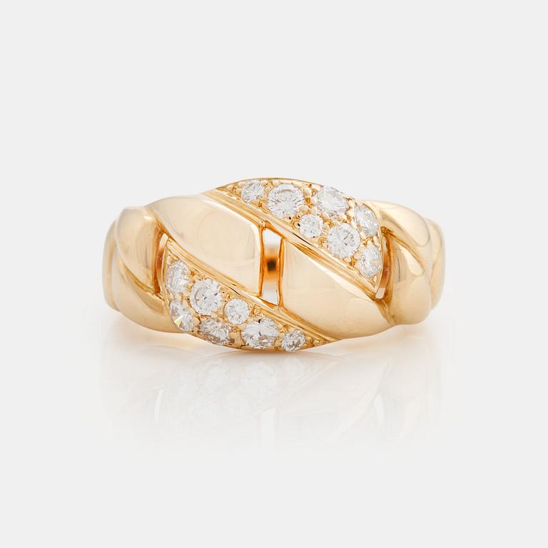 A brilliant cut diamond ring by Cartier.