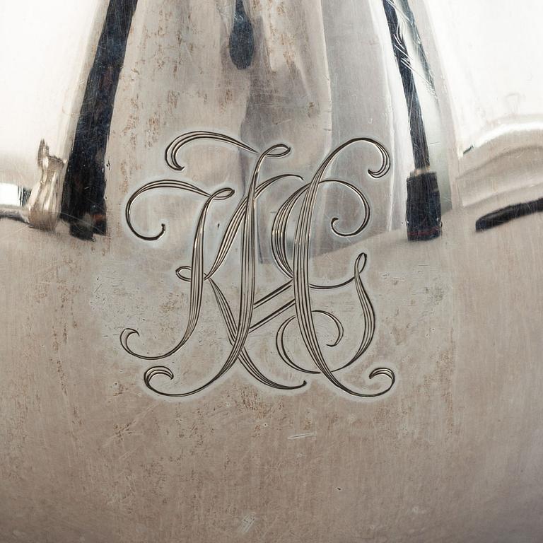 A swedish parcel-gilt coffee pot, creamer and suga bowl.