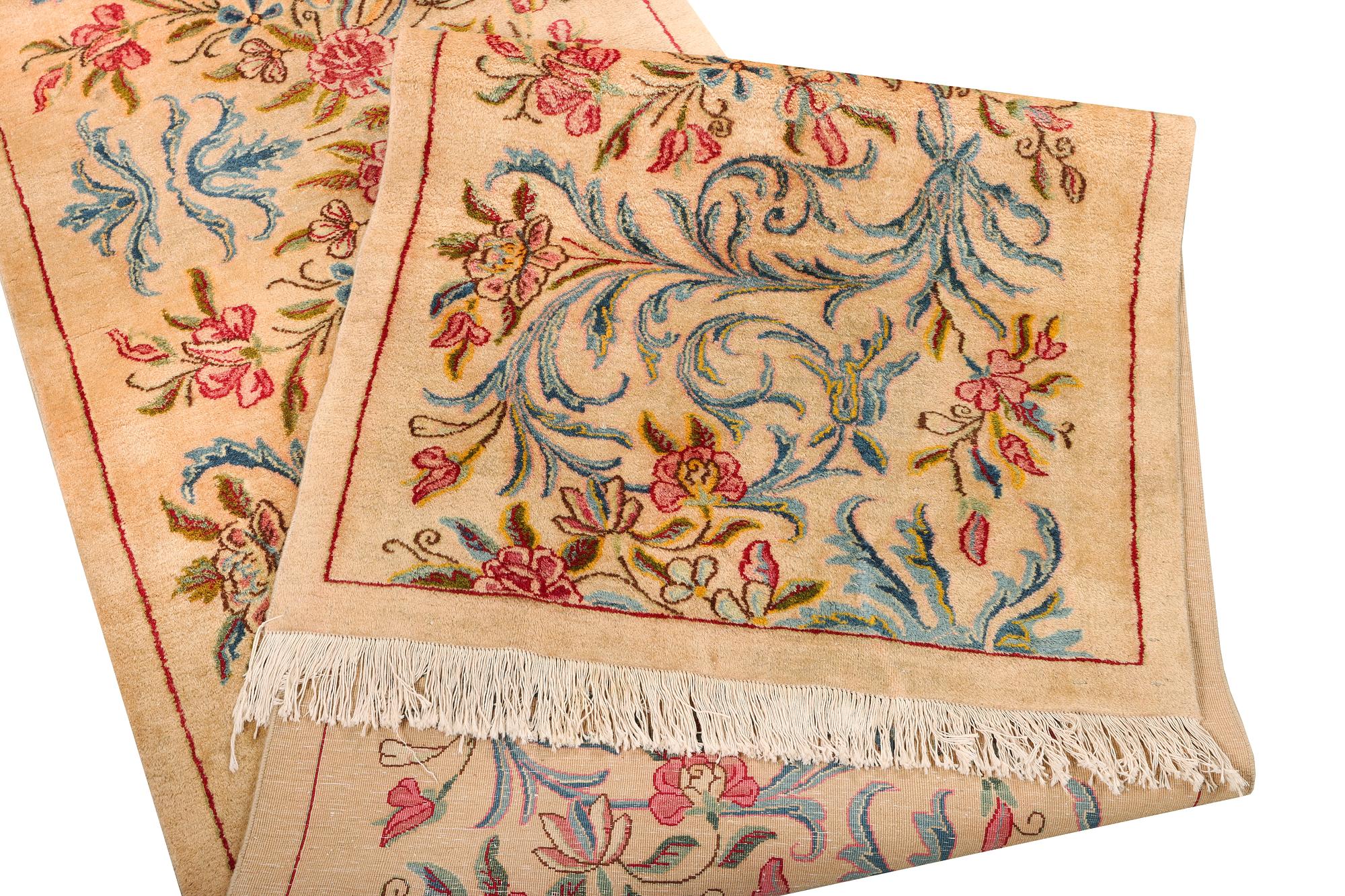 A semi-antique Keshan runner, c. 523 x 82 cm.