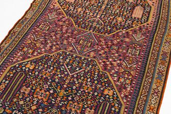 An antique kilim, southeastern Anatolia/Caucasus, c. 398 x 176 cm.