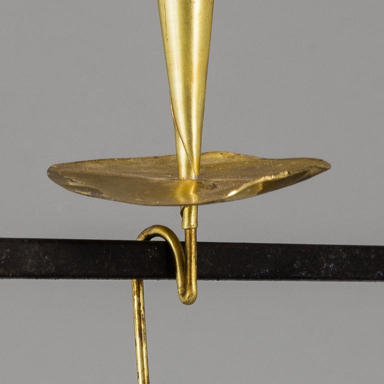 THOMAS HELLSTRÖM, a wrought iron and brass candelabrum from THO Hantverk Rättvik, Bleckogården, 1950's.