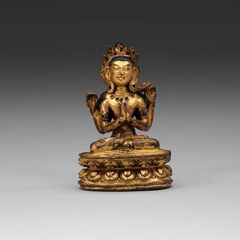 A Tibetan gilt copper alloy figure of Boddhisattva Shadakshari Lokeshvara, 16th Century or older.