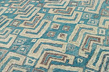 A Moroccan carpet, c. 398 x 200 cm.