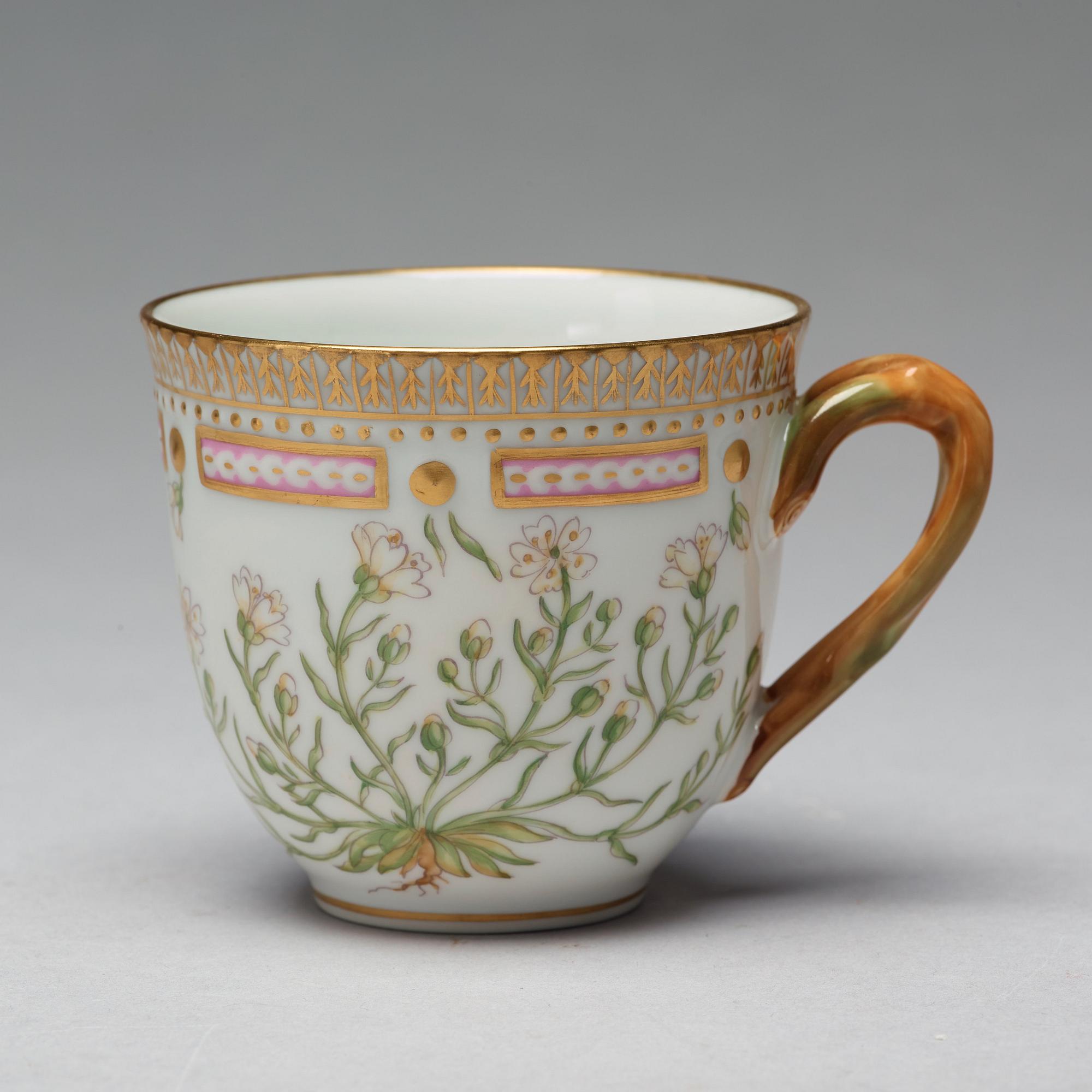 A set of four Royal Copenhagen 'Flora Danica' coffee cups with saucers, Denmark, 20th Century.