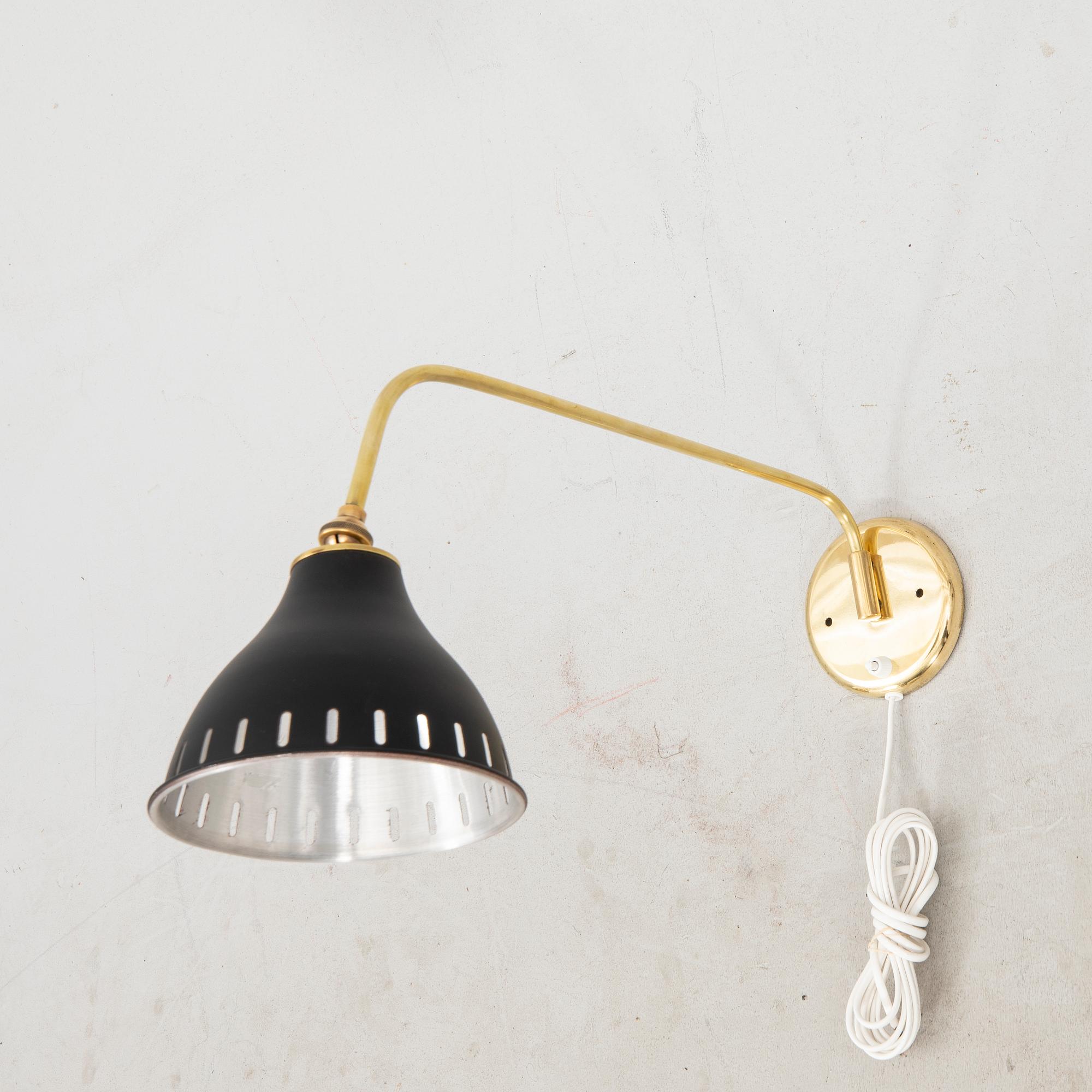 A bras wall lamp later part of the 20th century.