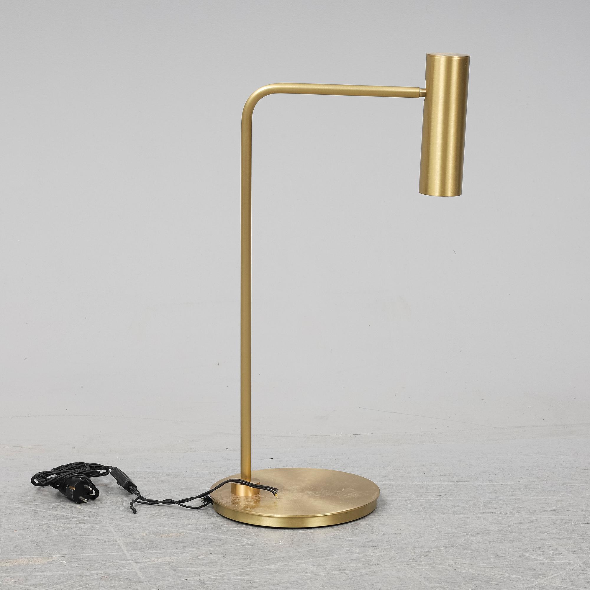 A 'Heron' brass table light by Michael Verheyden for CTO lighting.