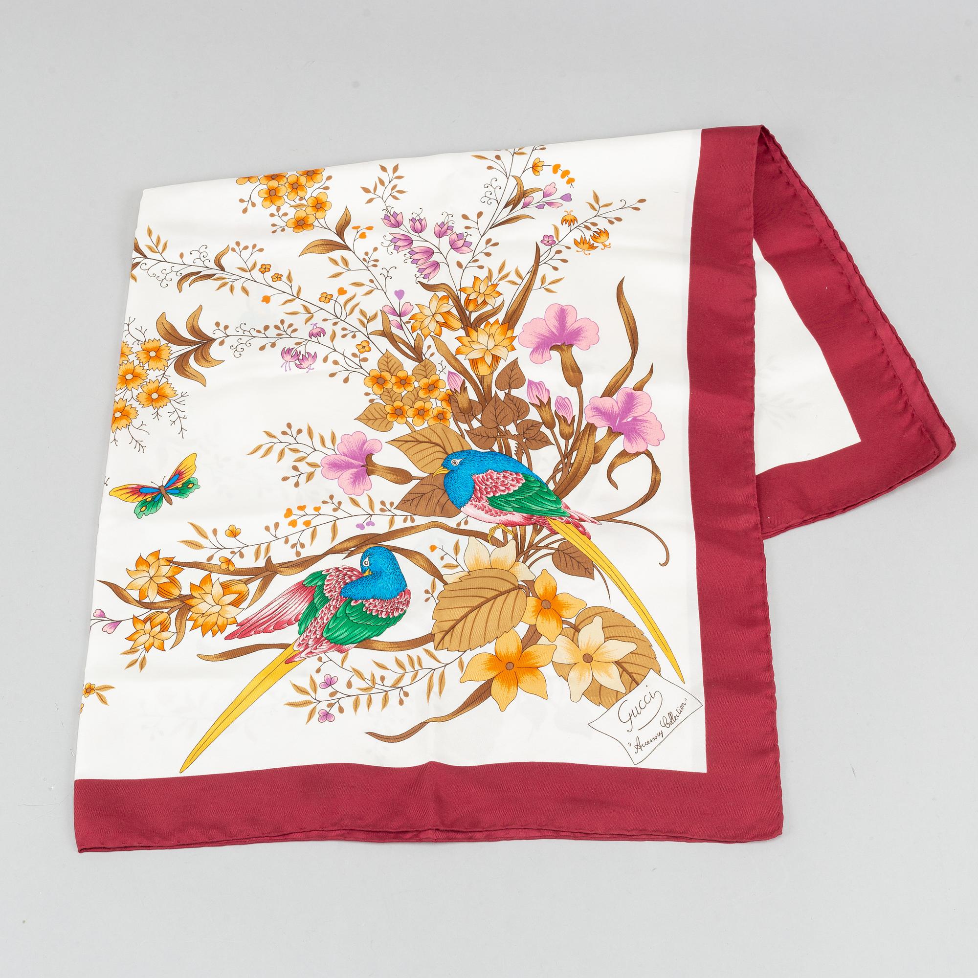 Gucci, a silk scarf.