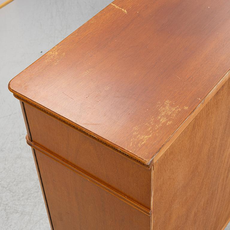 A cabinet, around the mid-20th century.