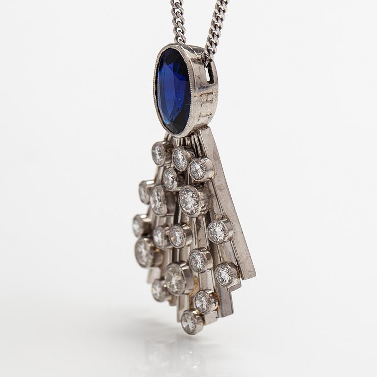 A platinum and 14K white gold necklace with a synthetic sapphire and diamonds ca. 1.10 ct in total.