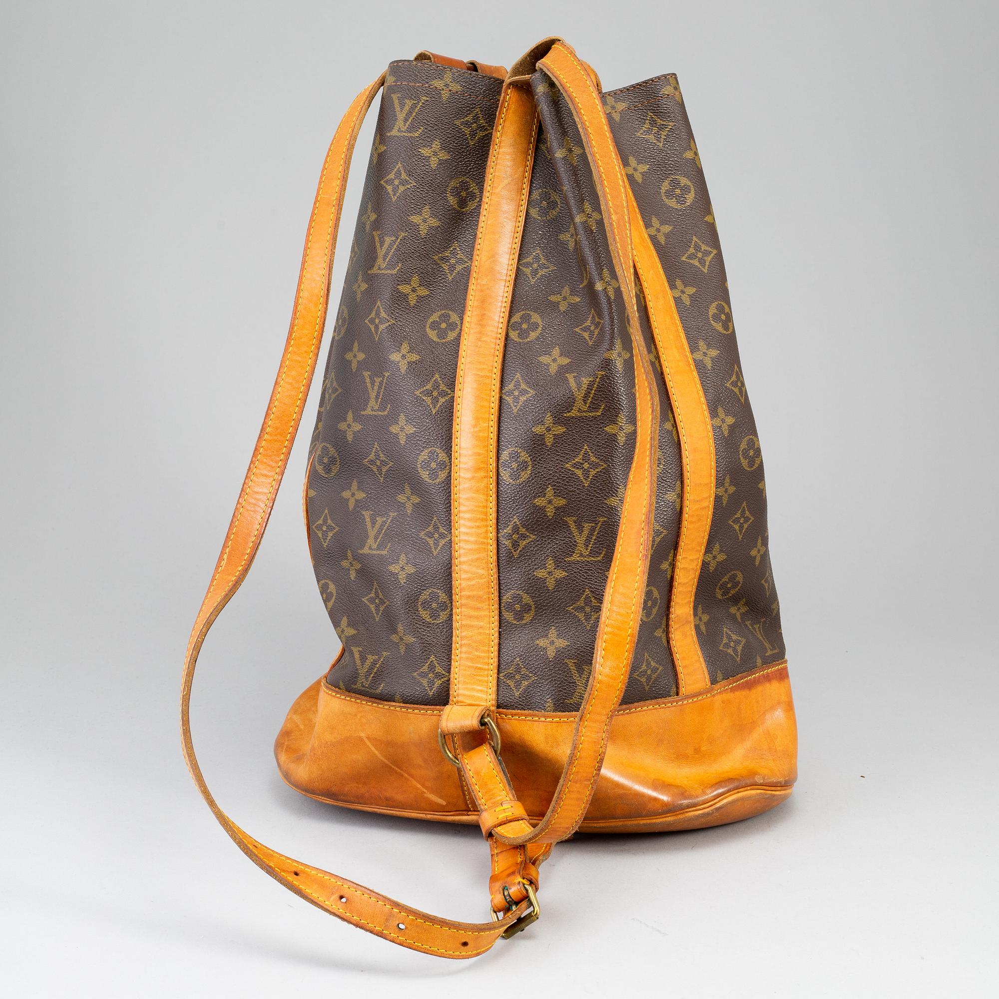 LOUIS VUITTON, a 'Randonne' monogram canvas handbag.