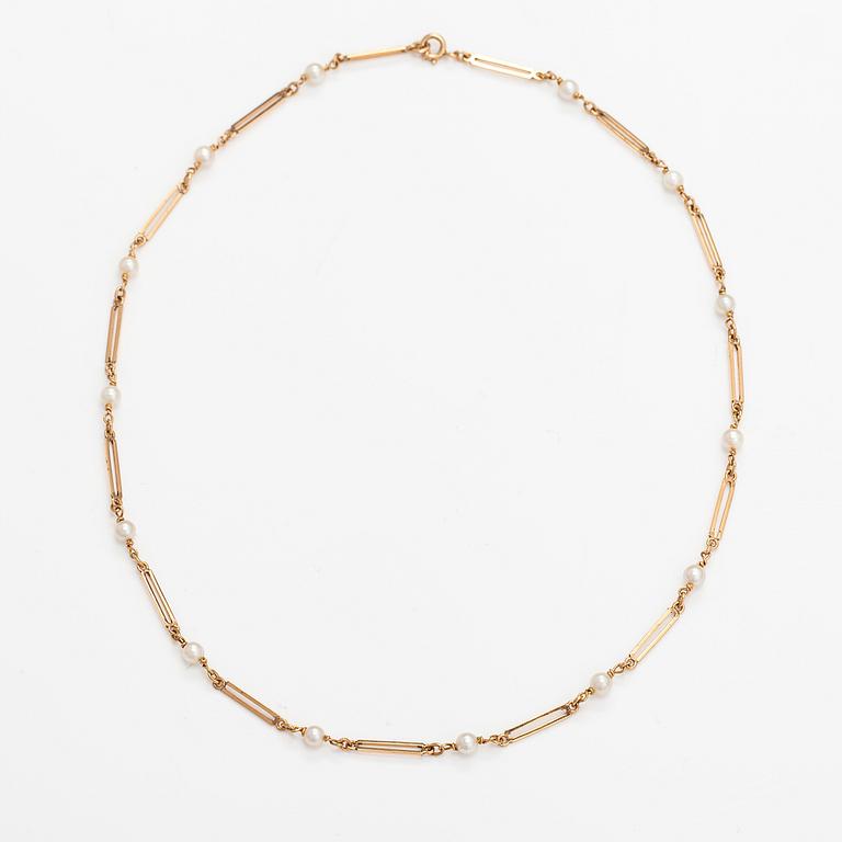 A 14K gold necklace with cuktured pearls. Westerback, Helsinki 1965.