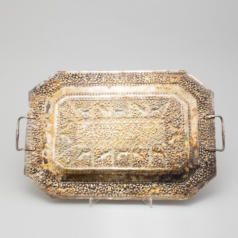 An Indian metal tray, circa 1900.