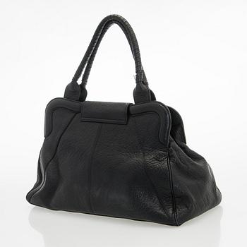 Max Mara, a leather handbag.
