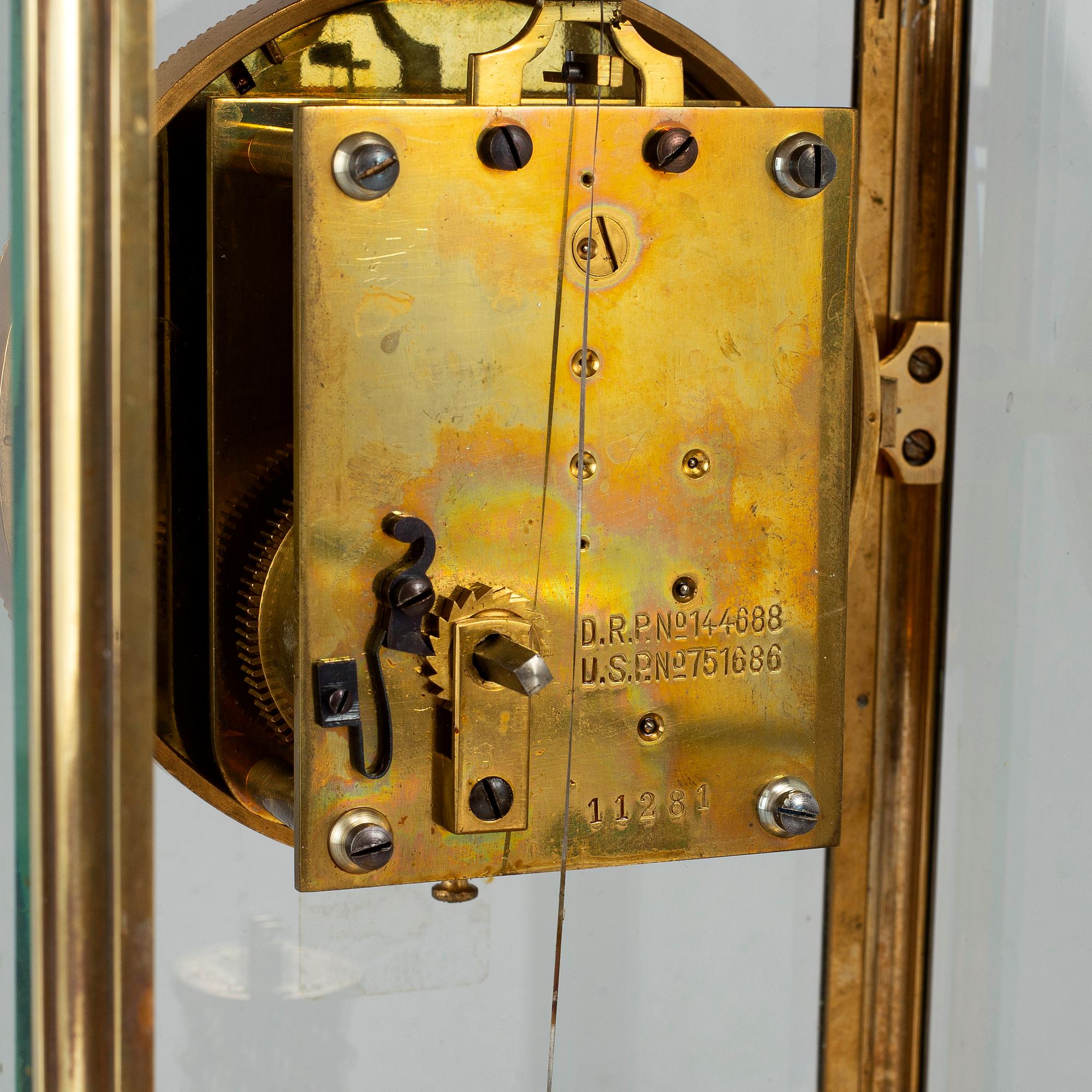 A French onyx and brass mantel clock, first half of the 20th century.