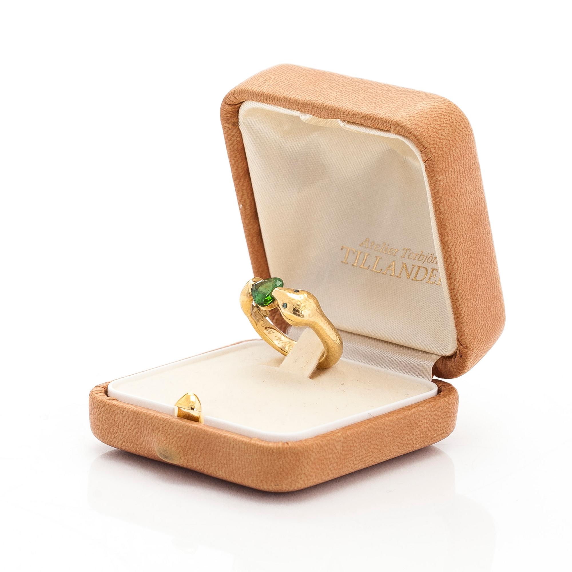 Torbjörn Tillander, an 18K gold serpent ring with heart-shaped green tourmaline and green diamonds, Helsinki 2011.