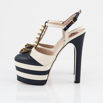 Gucci, a pair of navy and white leather high heel shoes, 2016, size 37.