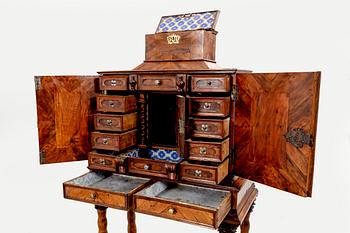 A first half of the 18th century walnut cabinet.