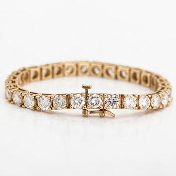 Tennisarmband, 14K guld med briljantslipade diamanter totalt ca 12.00 ct.