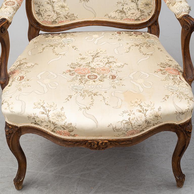 A mid 18th century Rococo arm chair.