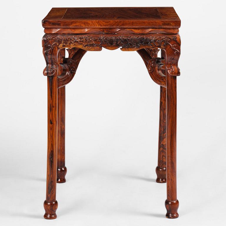 A Chinese huali square table with a lotus-leaf waist, 20th century.