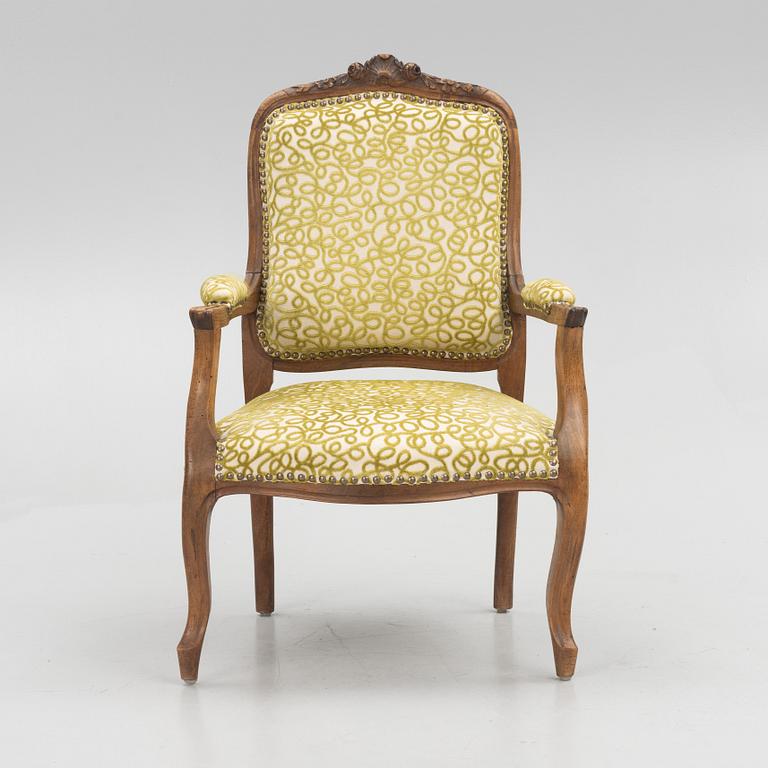 An Armchair, Louis XV style, 19th century.