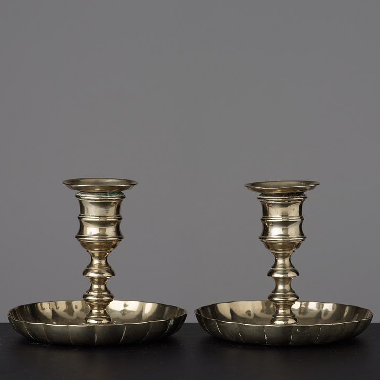 A pair of 18th century candlesticks.