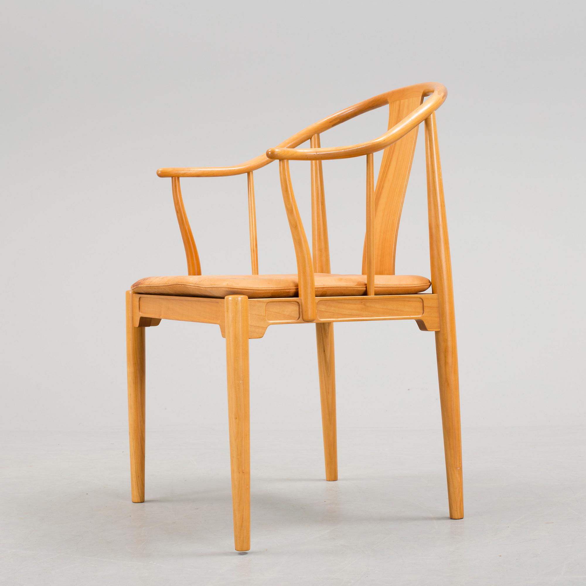 A Hans J Wegner 'Kinastolen' armchair, Fritz Hansen, Denmark 1971.