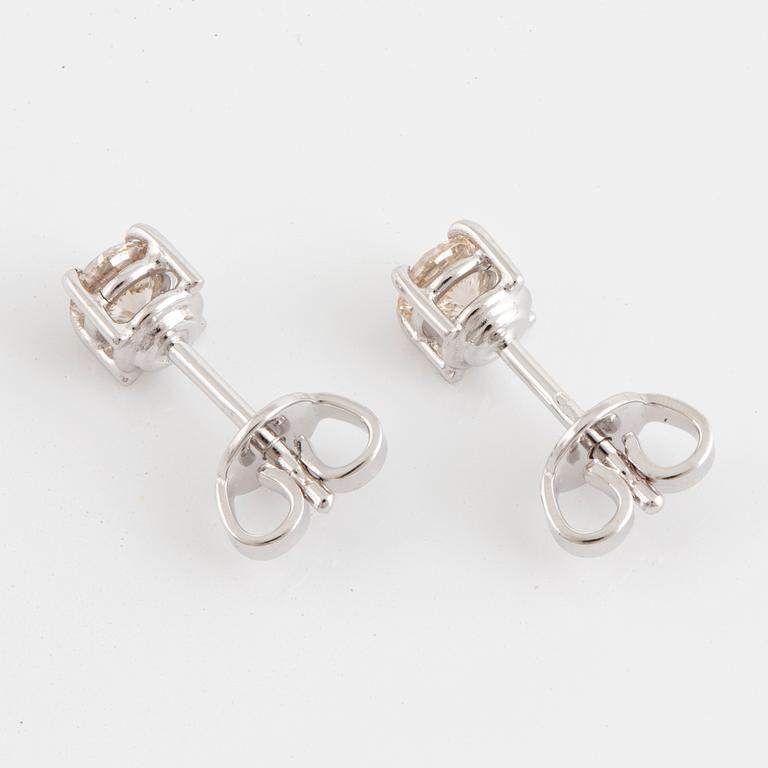 Brilliant-cut diamond stud earrings, with IGI report.