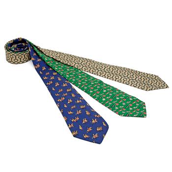 677. HERMÈS and SALVATORE FERRAGMO, three silk ties.