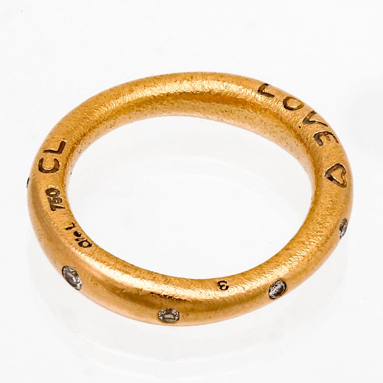 Ole Lynggaard ring 18K gold,  9 brilliant-cut diamonds 0,18 ct in total TW VS.