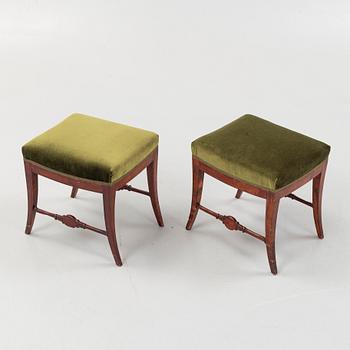 A pair of Swedish Empire stools, early 19th century.