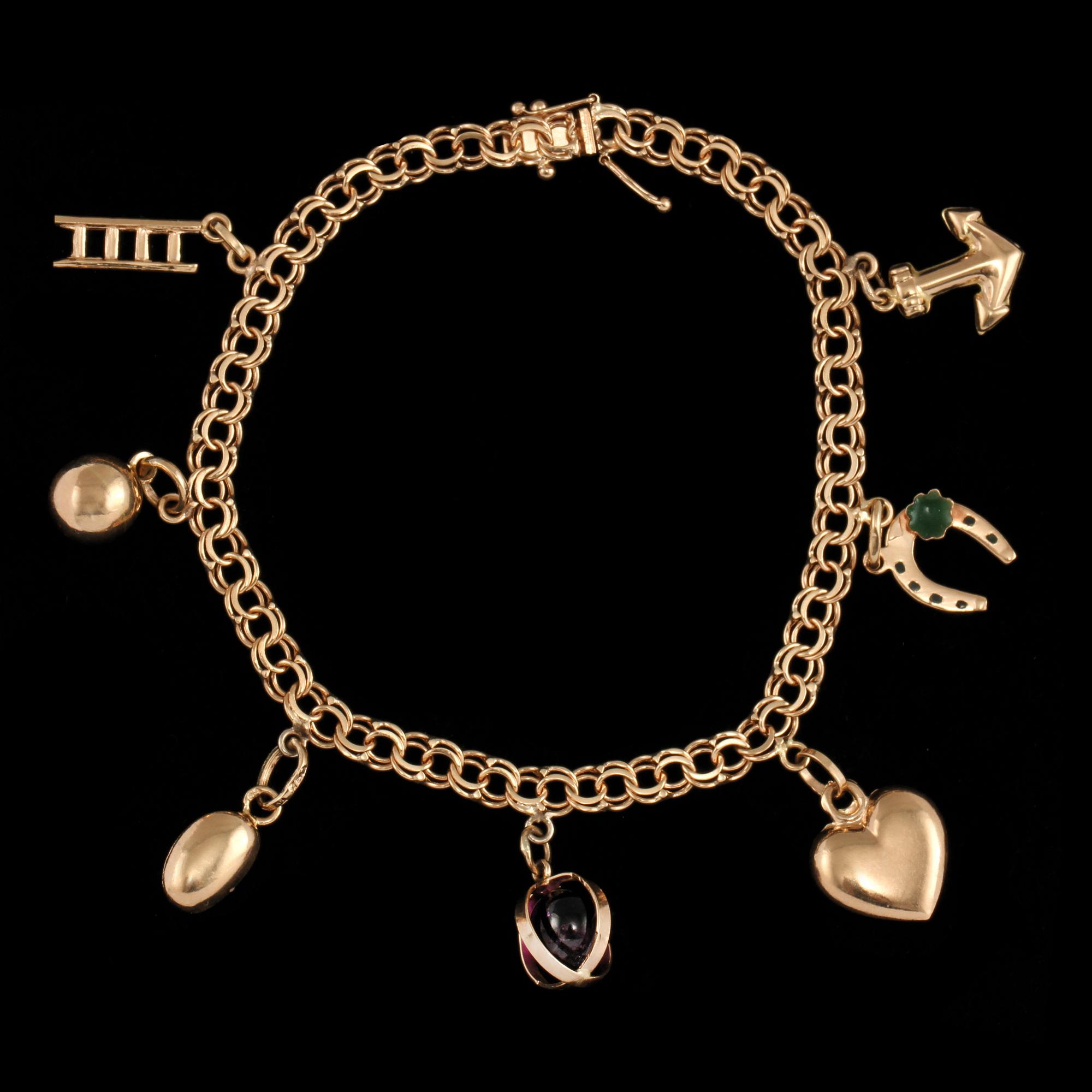 BERLOCKARMBAND, 18k guld samt ametist, Curt Hallberg, Köping, 1971. Vikt 11 g.